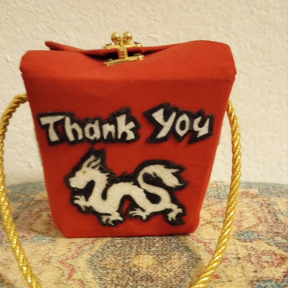 Handmade functional art minaudiere handbag. Take out carton.